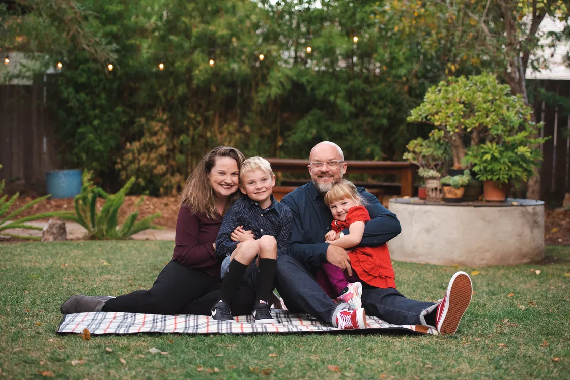 Dave, Jessie, and their two children in their backyard in Petaluma, CA.